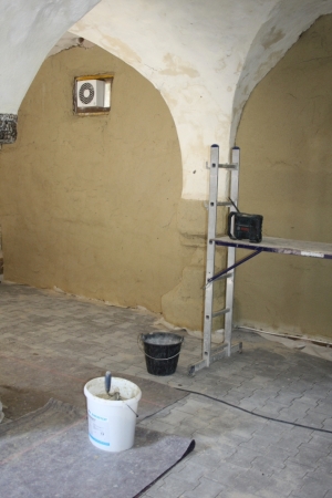 sacrificial render in the cow stable