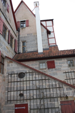 four-poster bed stead with reopened window