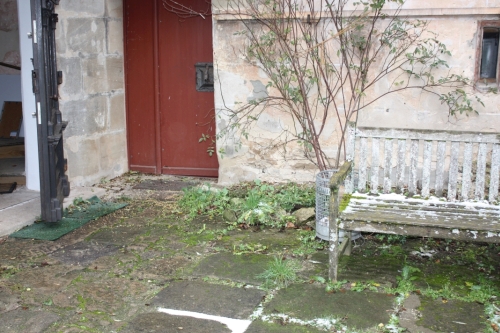 bench in front of the hall of weapons